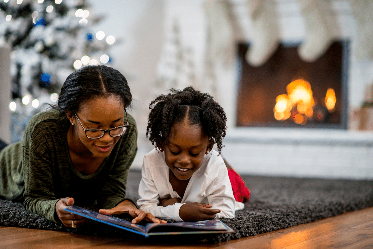 Mom and child reading during winter break